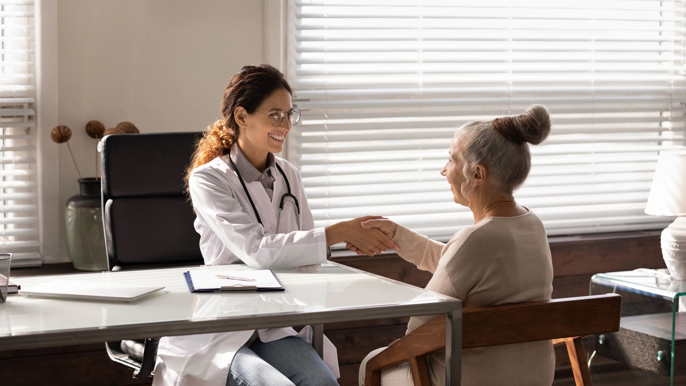 Clinician greeting a client during a supportive care visit
