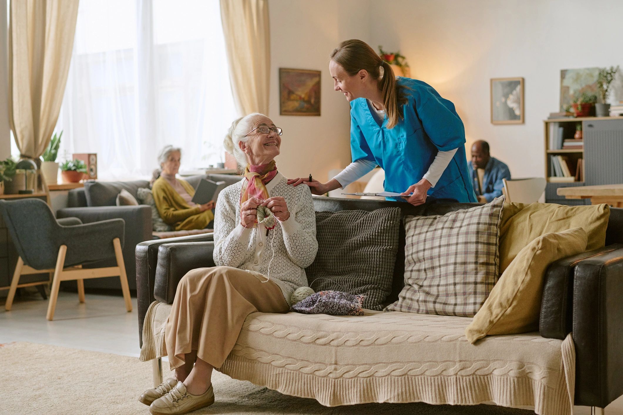 Nurse supporting a client at home